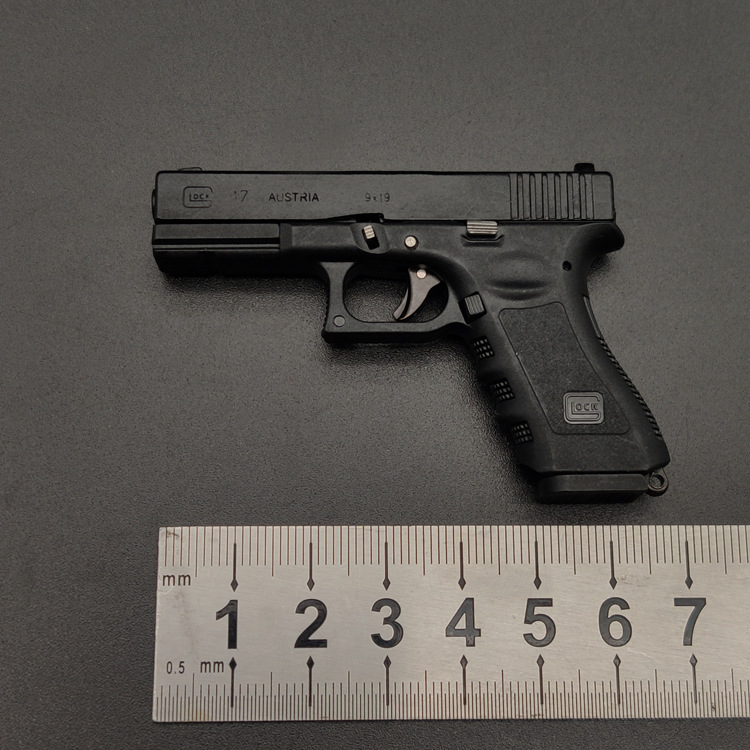 CNC Alloy Empire 1:4 GLOCK 17 Throw Shell Tactical Tiny Keychain